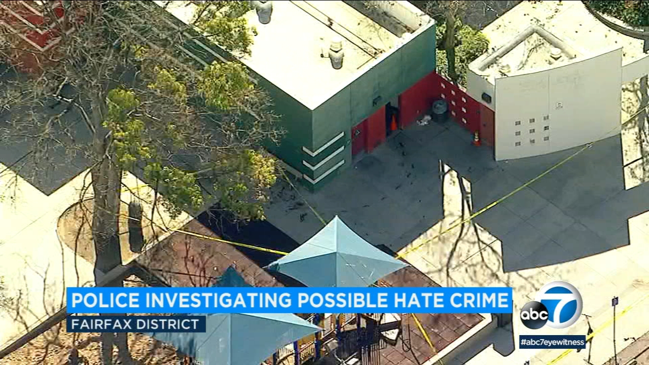 Police search for victim after swastikas drawn in blood found at Pan
