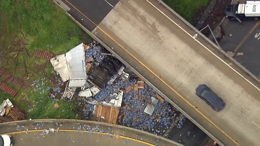 Big rig hauling Modelo beer crashes on freeway off-ramp in West Covina, spilling hundreds of cans