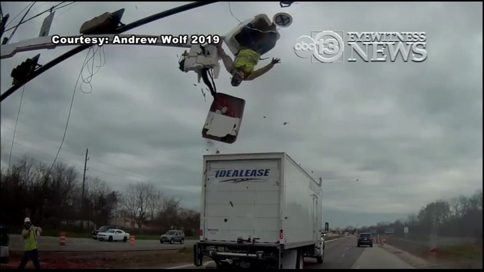 Worker walks away from truck crash that sent him flying out of his ...
