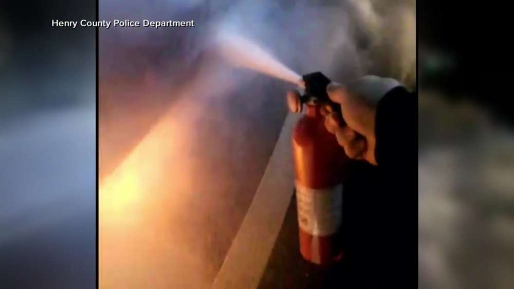 Bodycam shows officers save man from burning car