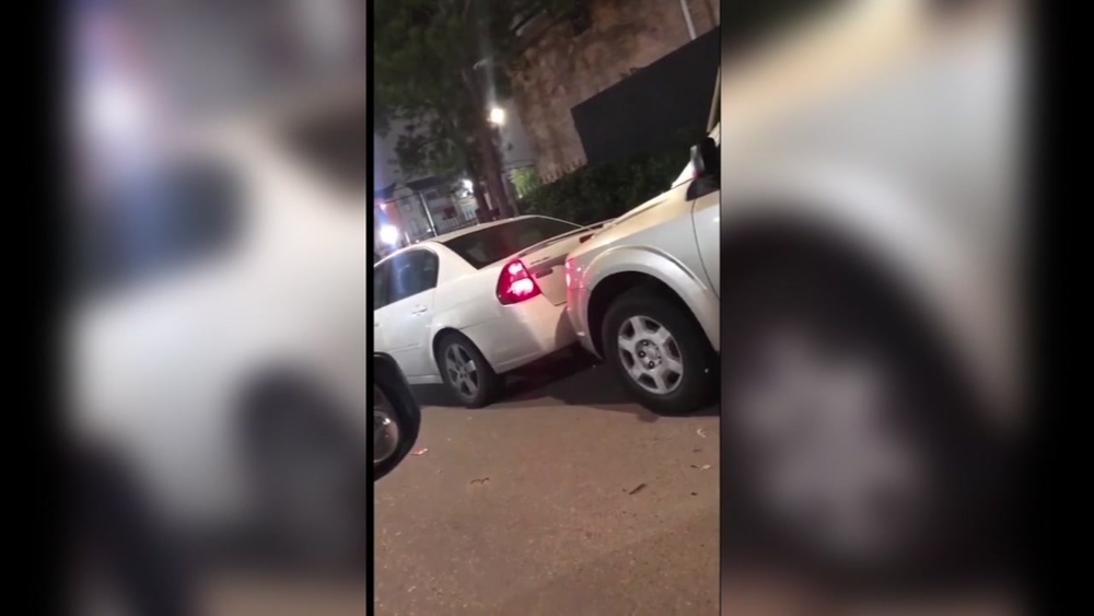 TIGHT SQUEEZE: Car pushes SUV after parking too close