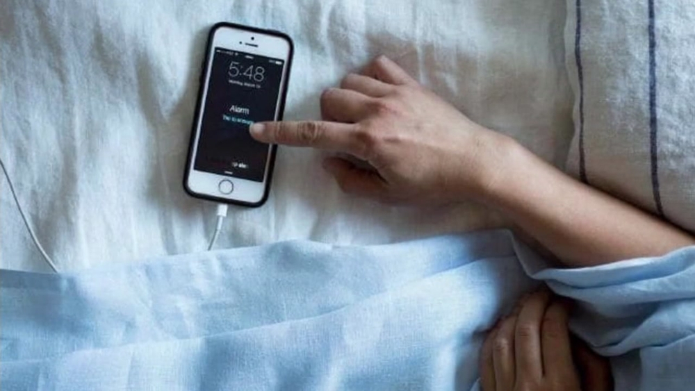 Sleep experts asking Apple to dump snooze button on iPhone Clock app