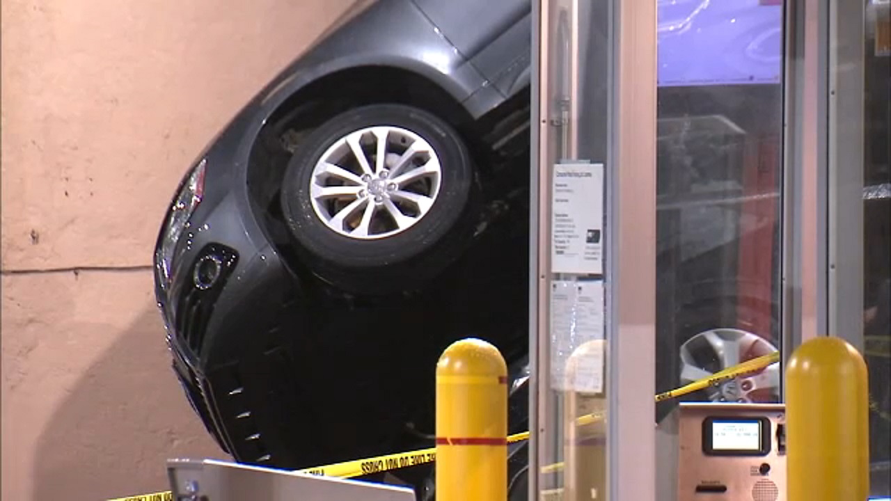 Parked car dropped onto another car in Brooklyn garage lift fail