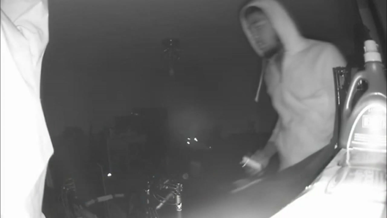 Security video shows burglar inside home as child sleeps