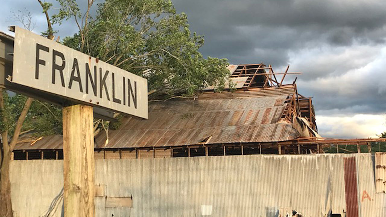 Community working together to clean area affected by EF-3 tornado