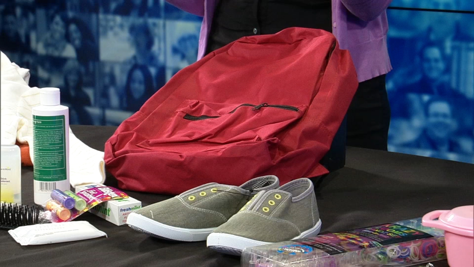 Cradles to Crayons Collecting toys, clothes for families in need