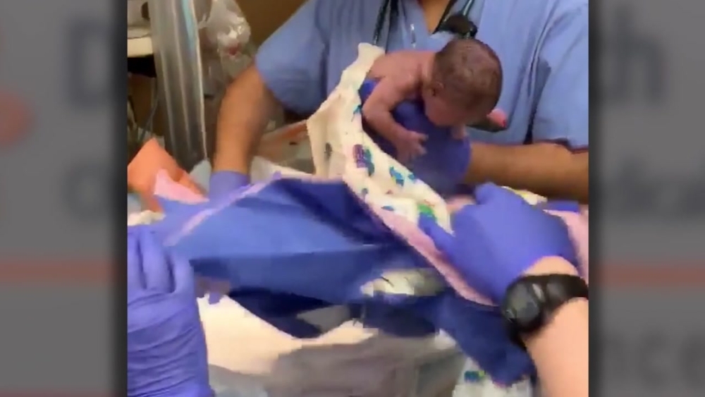 Newborn baby dropped in delivery room