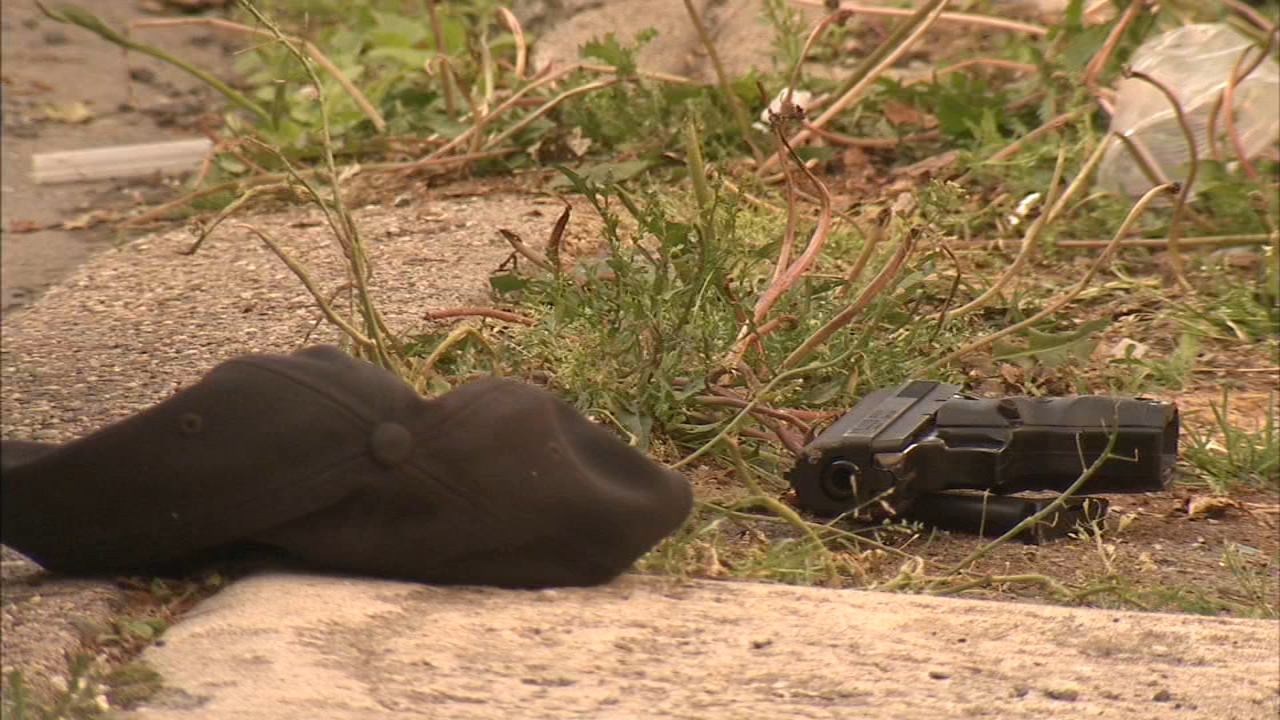 Police: Man running with rock, damaging cars shot by Philly resident