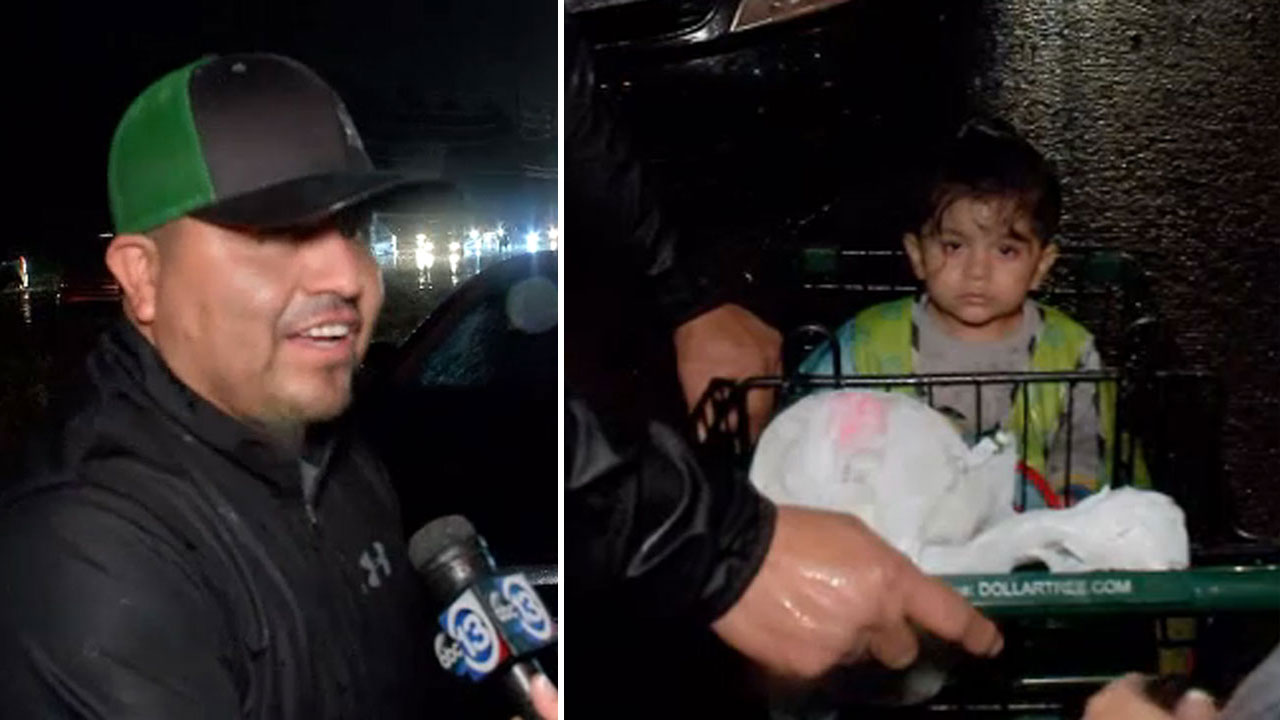 Man escapes floods with baby in shopping basket
