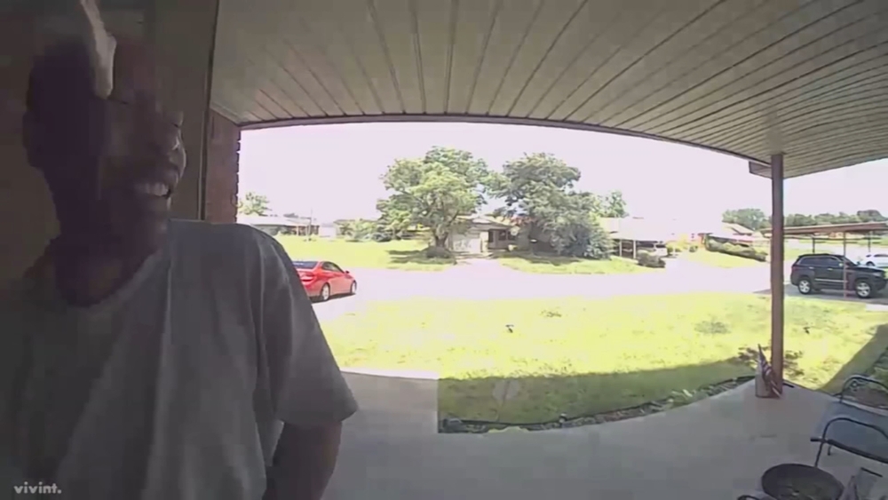 VIDEO: Snake bites man in face at friend's door