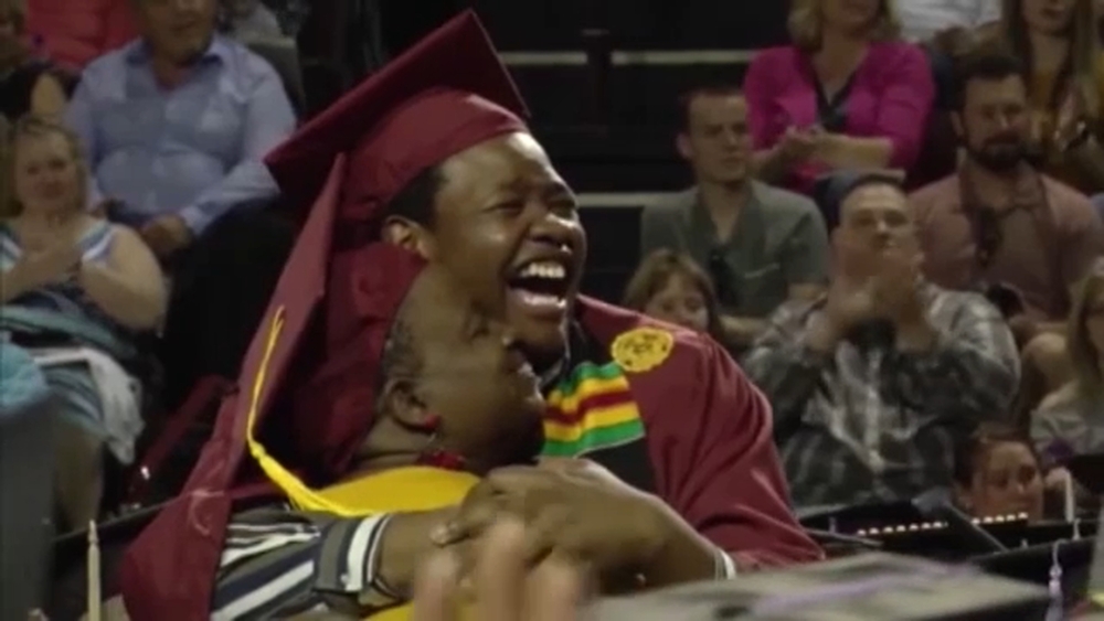 Graduating mother surprises graduating son
