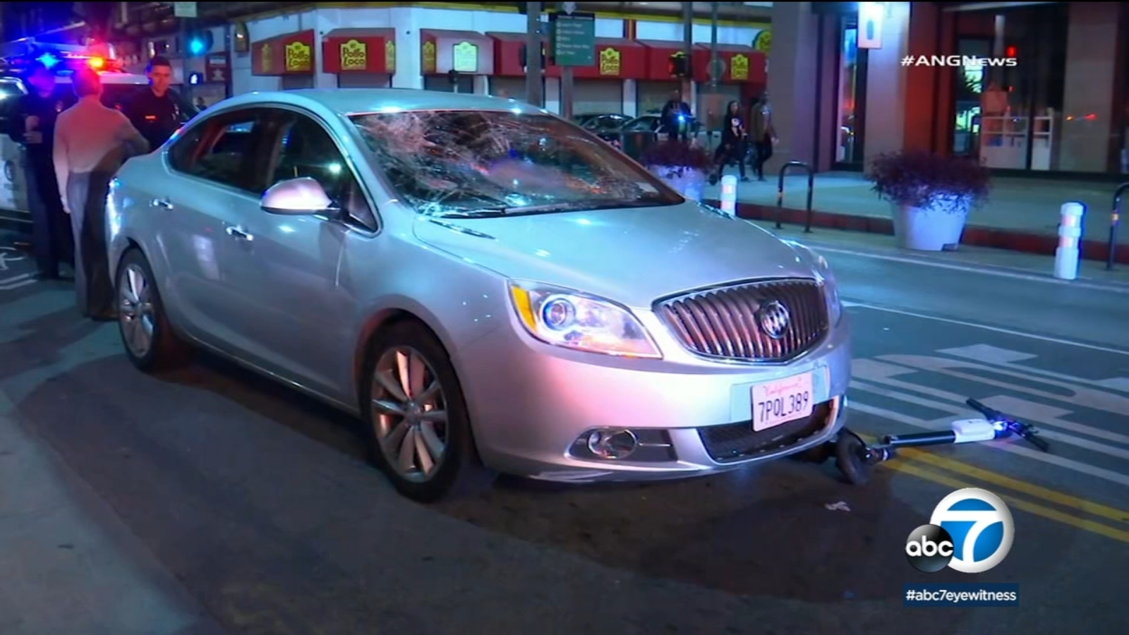 Scooter rider hit by car after allegedly running red light in downtown ...