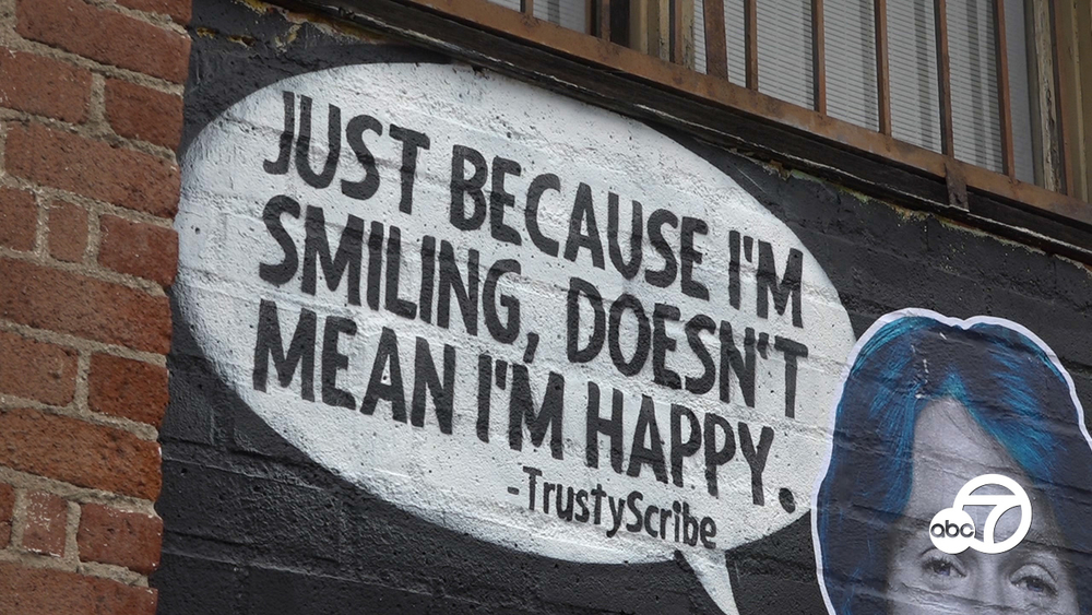 Street artists paint mental health awareness message 
