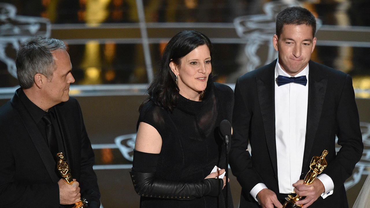 Dirk WilutzkyLaura Poitras and Glenn Greenwald accept the award for Best Documentary Feature for "Citizenfour."