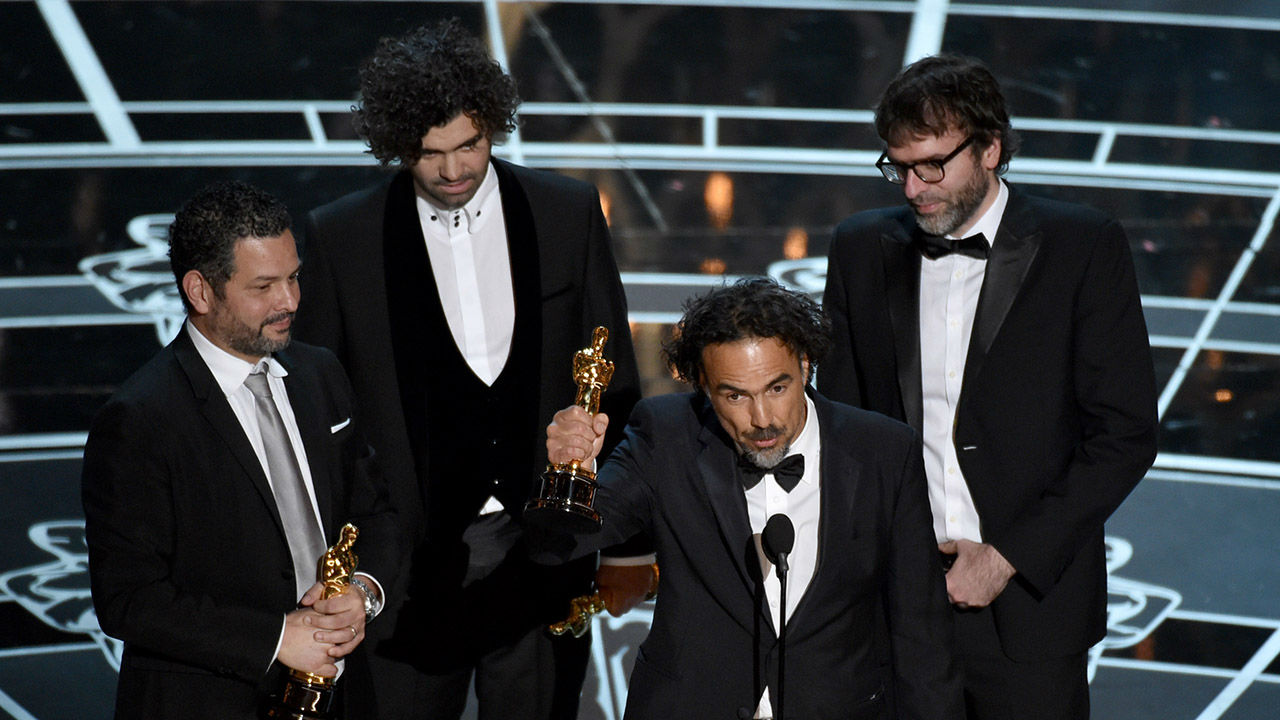 Aexander Dinelaris, Armando Bo, Alejandro G. Inarritu and Nicolas Giacobone accept the award for the Best Original Screenplay for "Birdman."