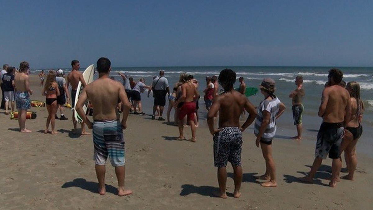 Surfers rescue four swimmers from rough waters at Emerald Isle