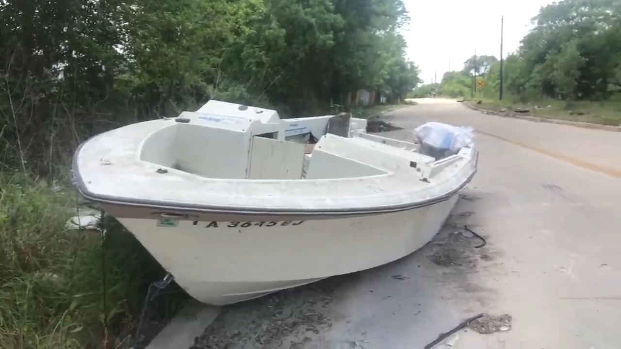 Furniture, mattresses and even a boat litter on an east Houston street.