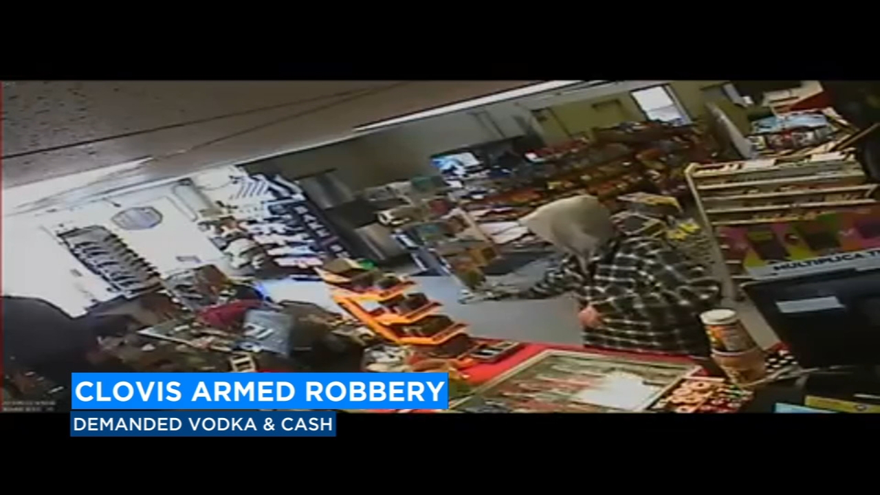 Suspect caught on camera robbing Clovis liquor store