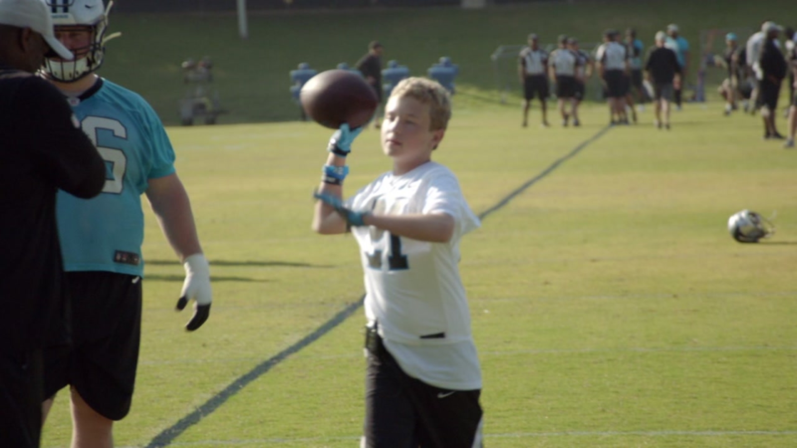 Panthers invite boy battling cancer to practice and gain 'extra juice'