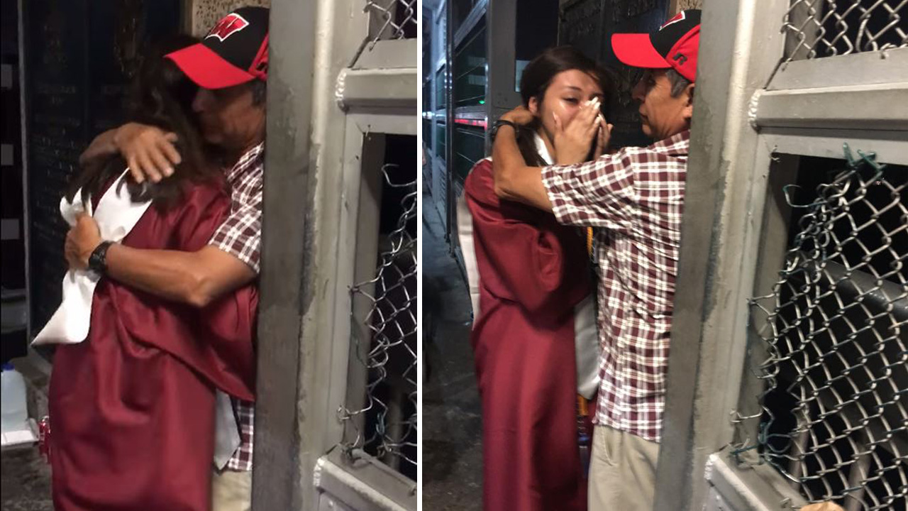 Texas graduate celebrates by hugging father at Mexican border