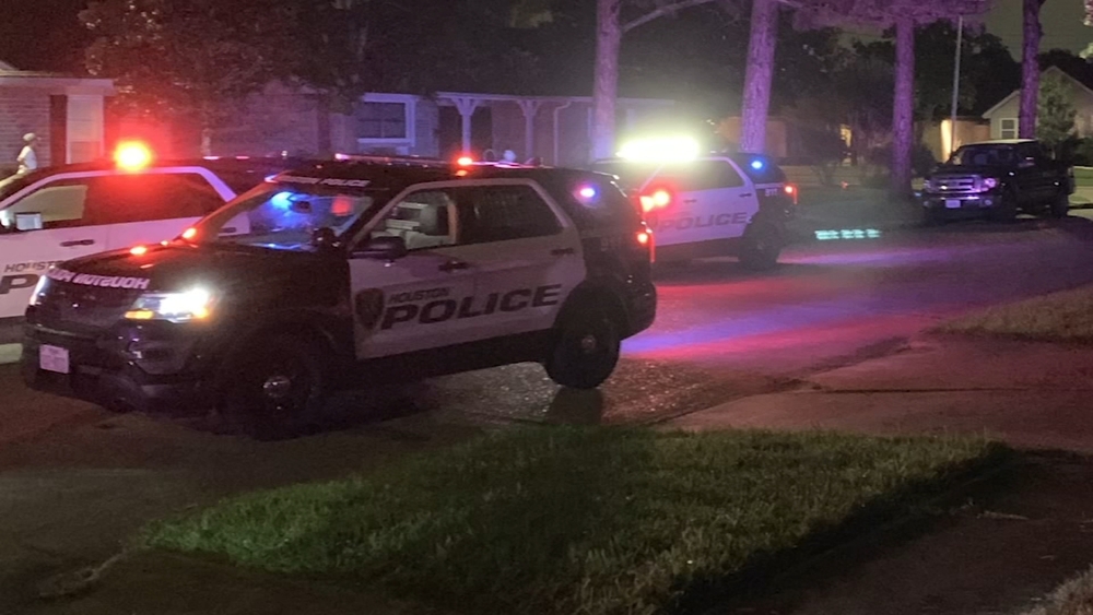 Men impersonating police shoot woman during home invasion, officials say
