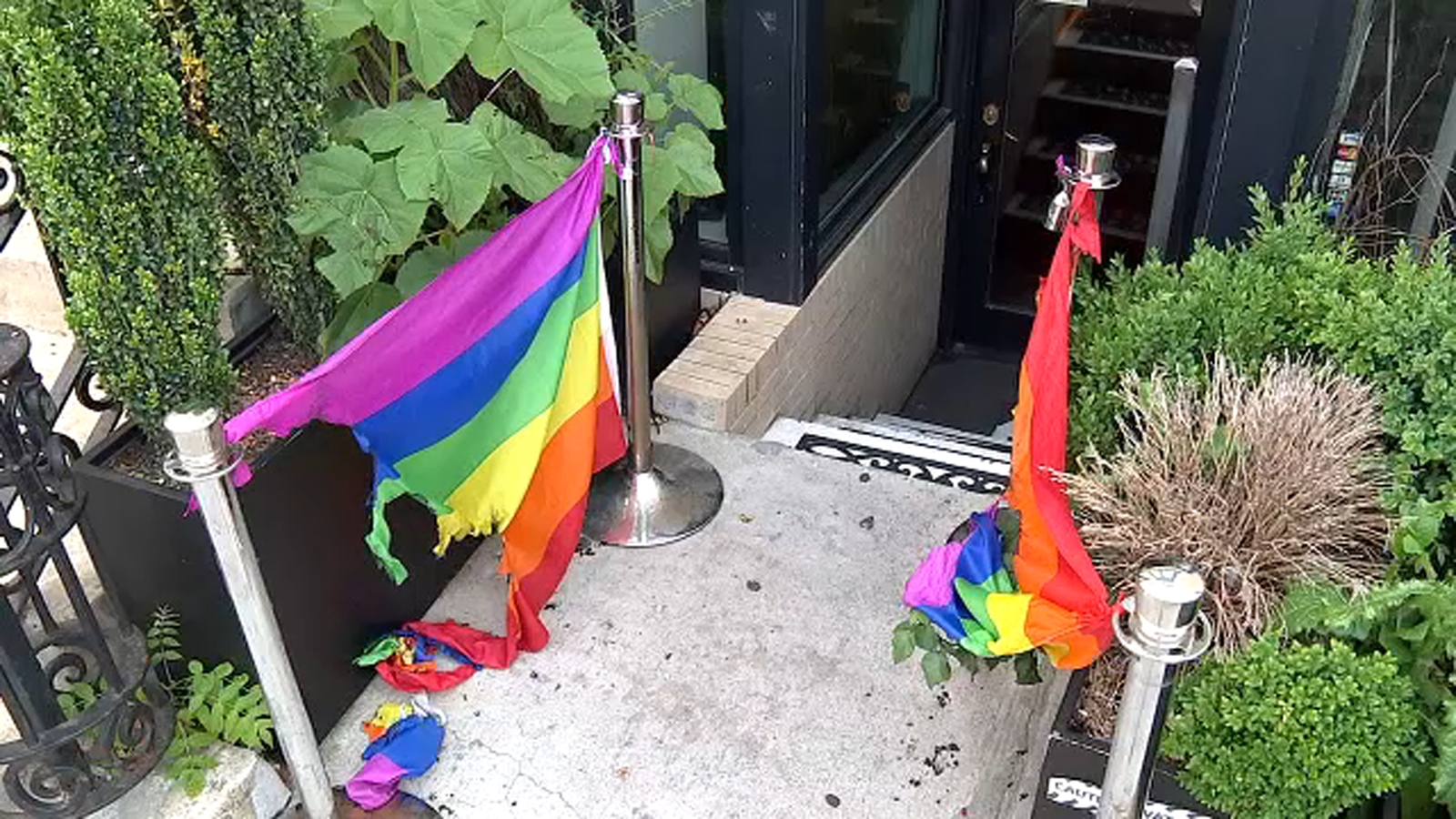 Police investigate hate crime after 2 rainbow flags were set on fire ...