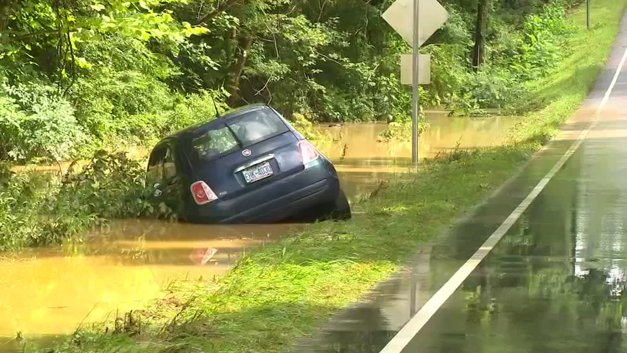 Woman says man pulled her out of flooded car in Wake Forest