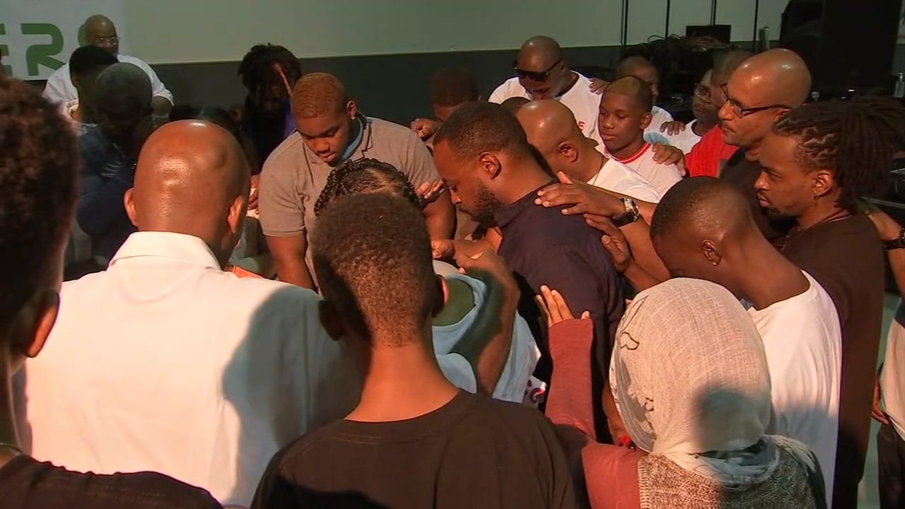 Men of faith help father of 11-year-old shot and killed