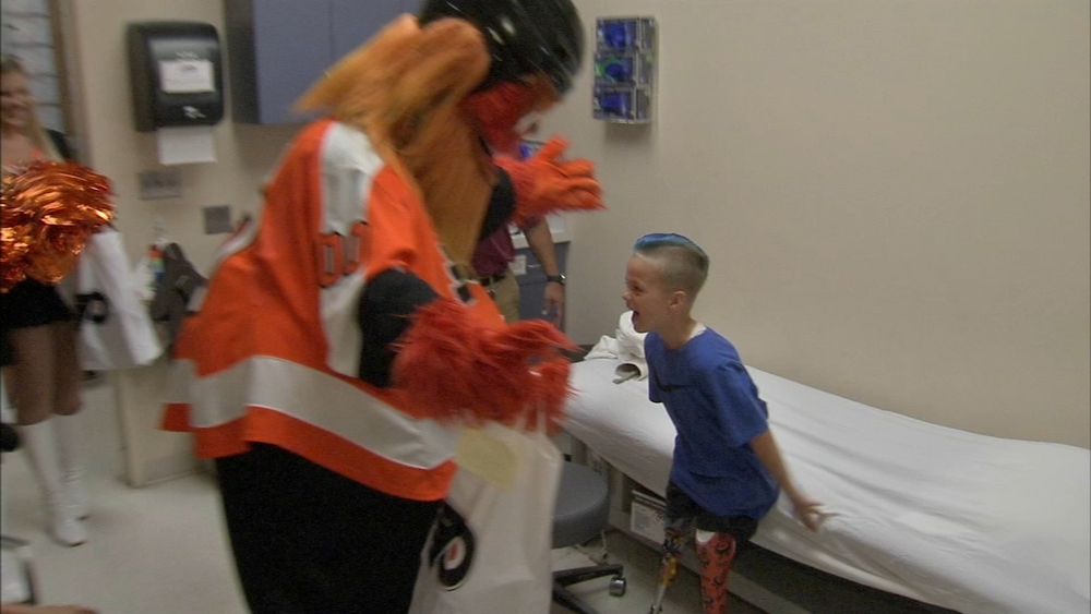Boy gets custom Gritty prosthetic leg, surprise visit from mascot