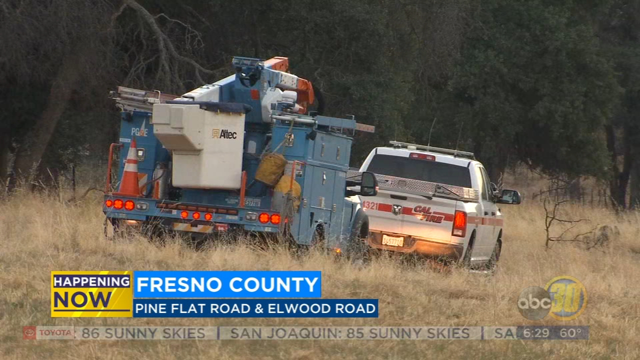 Fire crews and PG&E investigating cause of grass fire below Pine Flat Dam