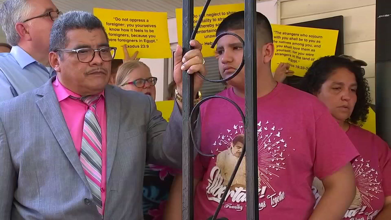 Durham community members rally around pastor in sanctuary