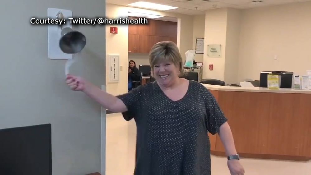 WATCH: Woman accidentally breaks 'cancer-free' bell in excitement