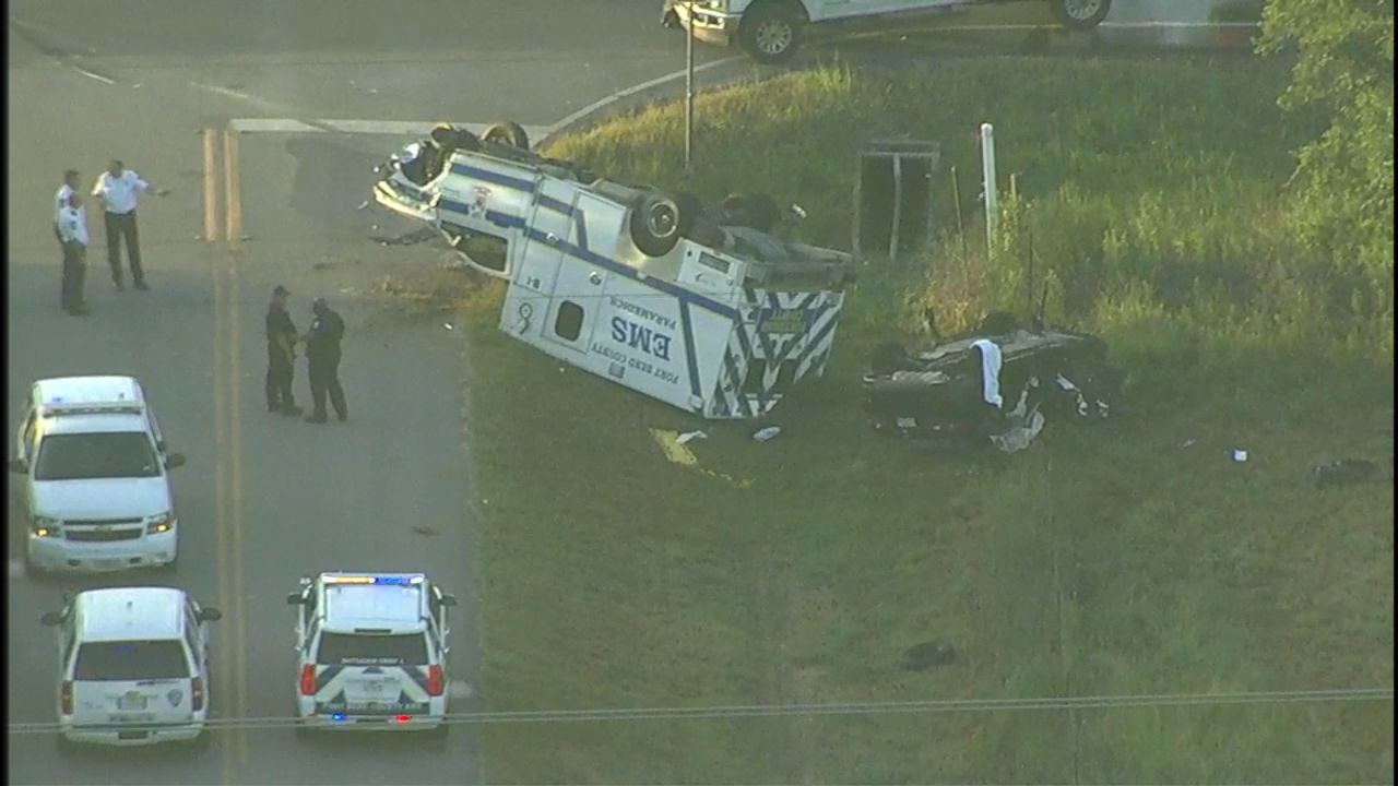 rollover crash involving ambulance and vehicle in needville fort bend county ems