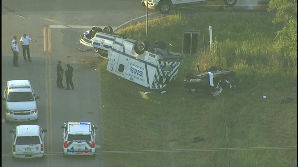 Rollover crash involving ambulance and vehicle in Needville