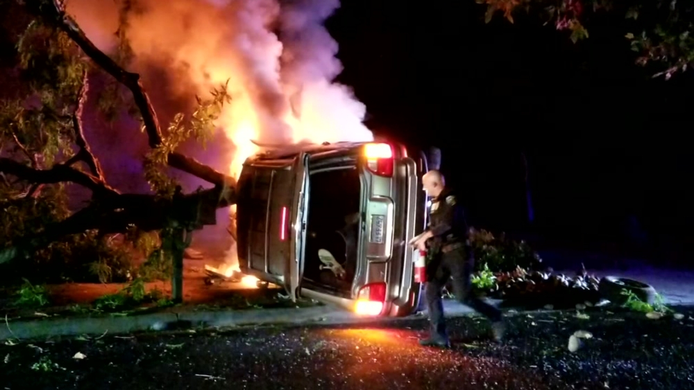 VIDEO: Fremont officer pulls man from burning vehicle