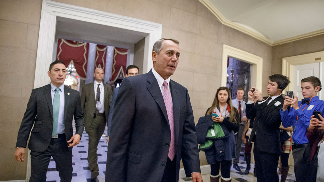 House Speaker John Boehner of Ohio returns to his office on Capitol Hill in Washington