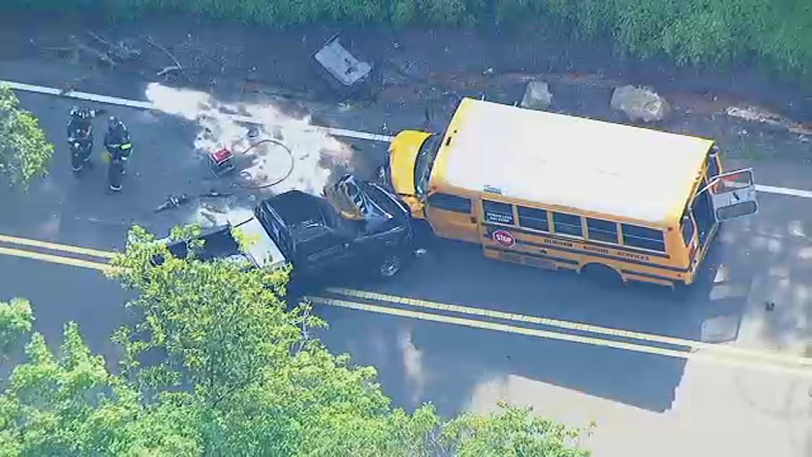 School bus involved in headon collision with pickup truck in Oakland