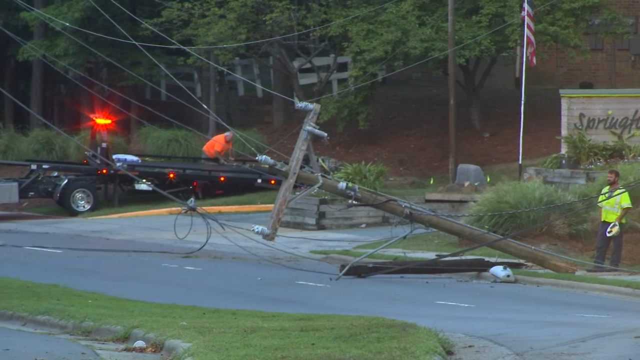 2 hurt after Audi goes airborne and hits utility pole, police say