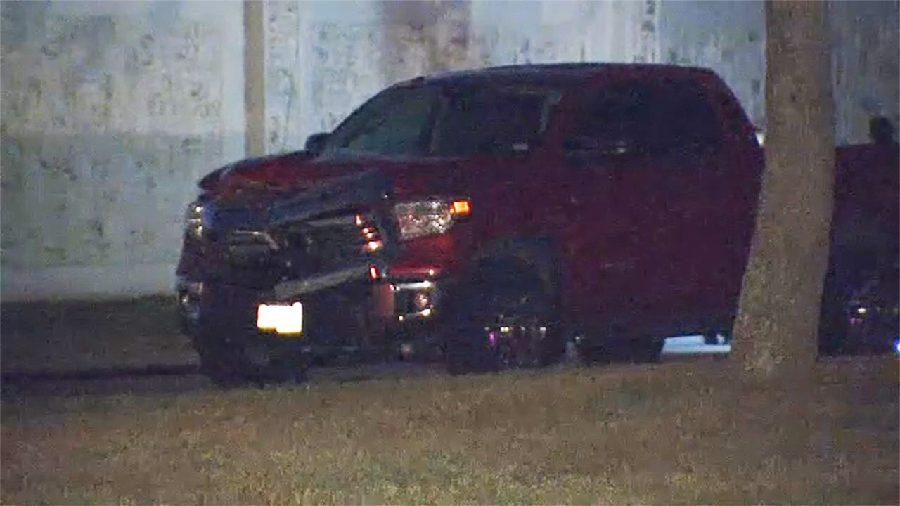 Woman hit and killed while putting up real estate signs