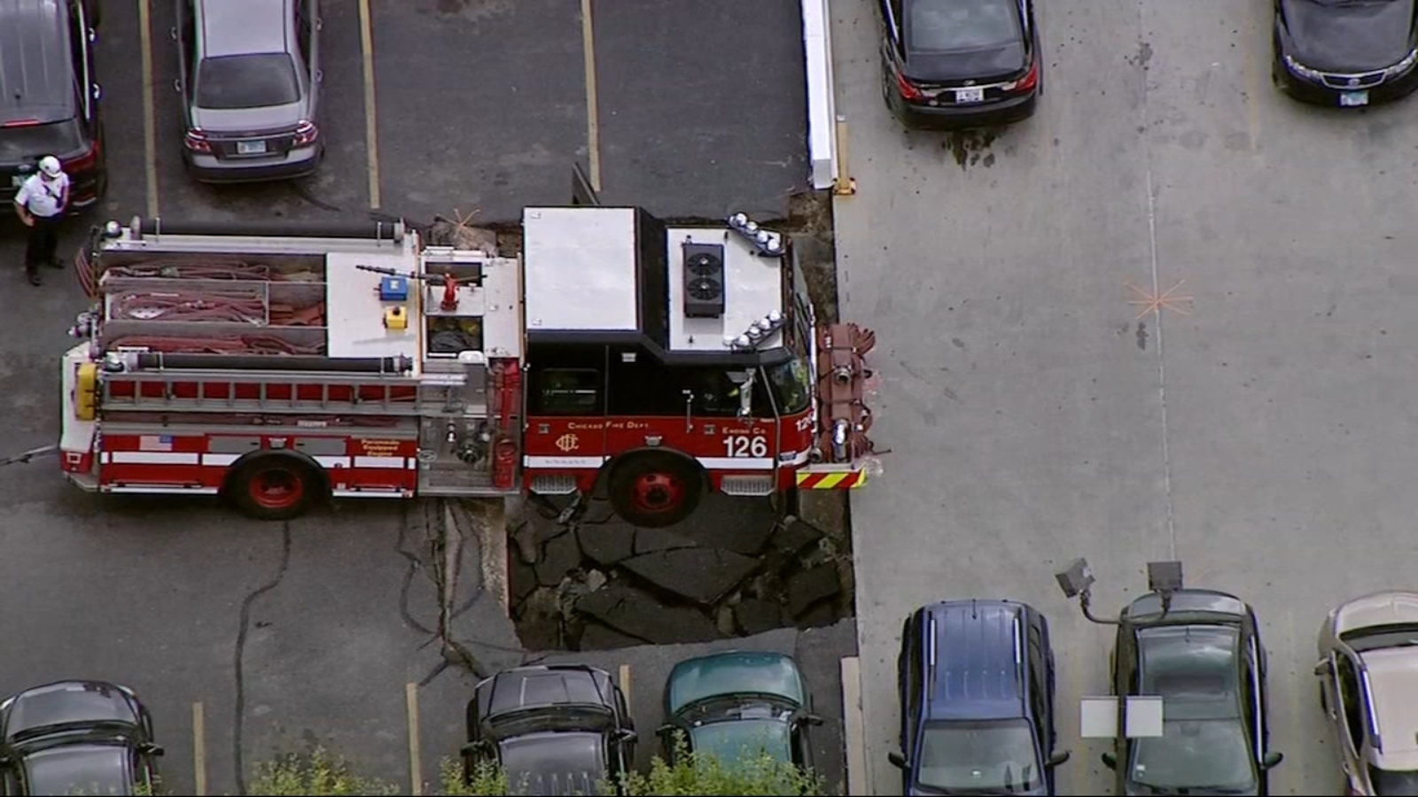 Parking garage partially collapses underneath Chicago Fire Dept. engine