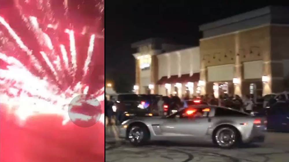 Dozens take over intersection with car stunts and fireworks