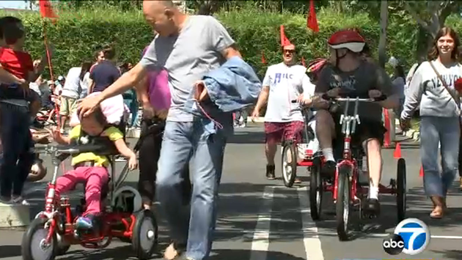 Long Beach tricycle giveaway brings smiles to children with