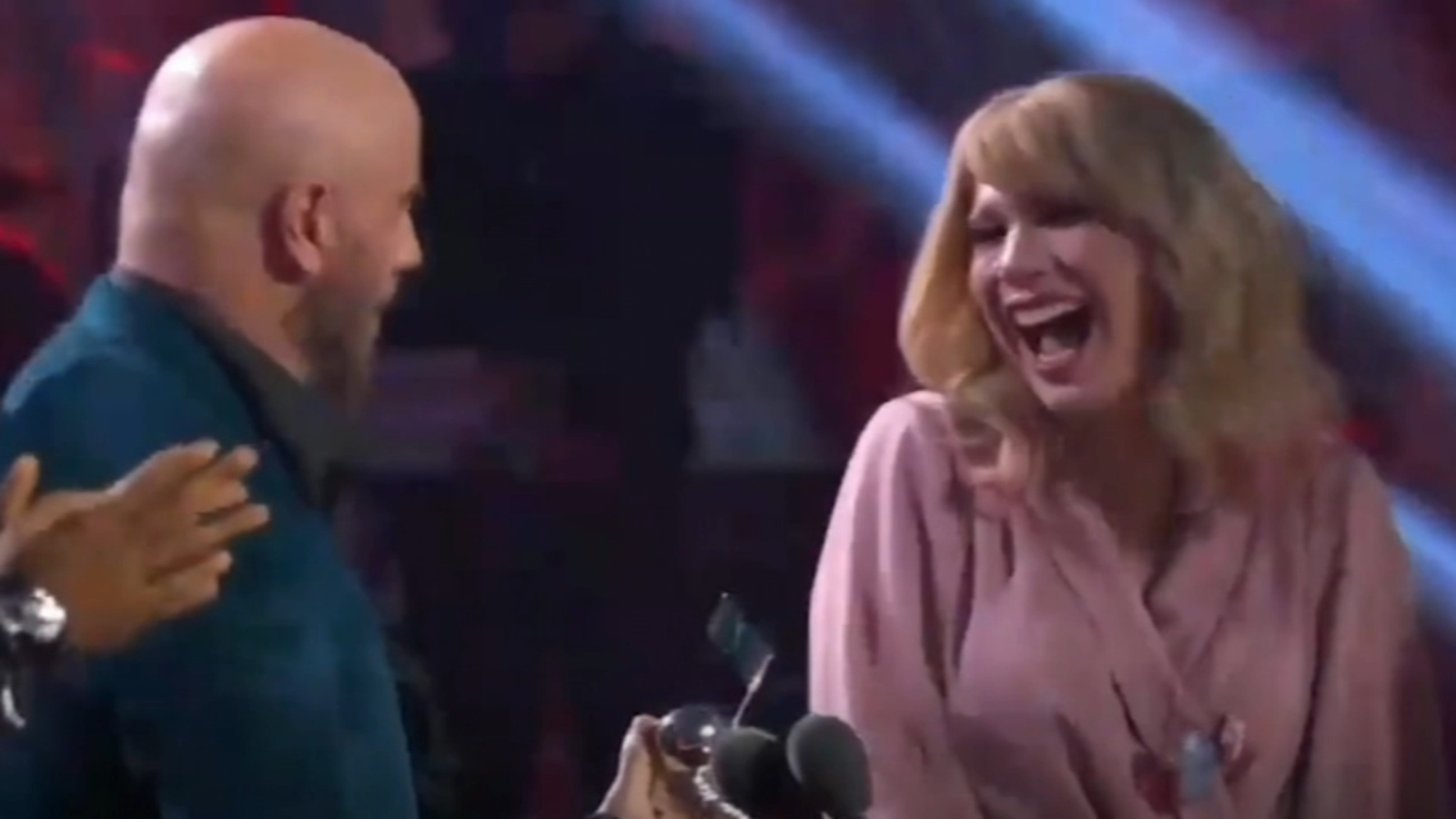 John Travolta mistakenly hands off Taylor Swift's VMA award to drag
