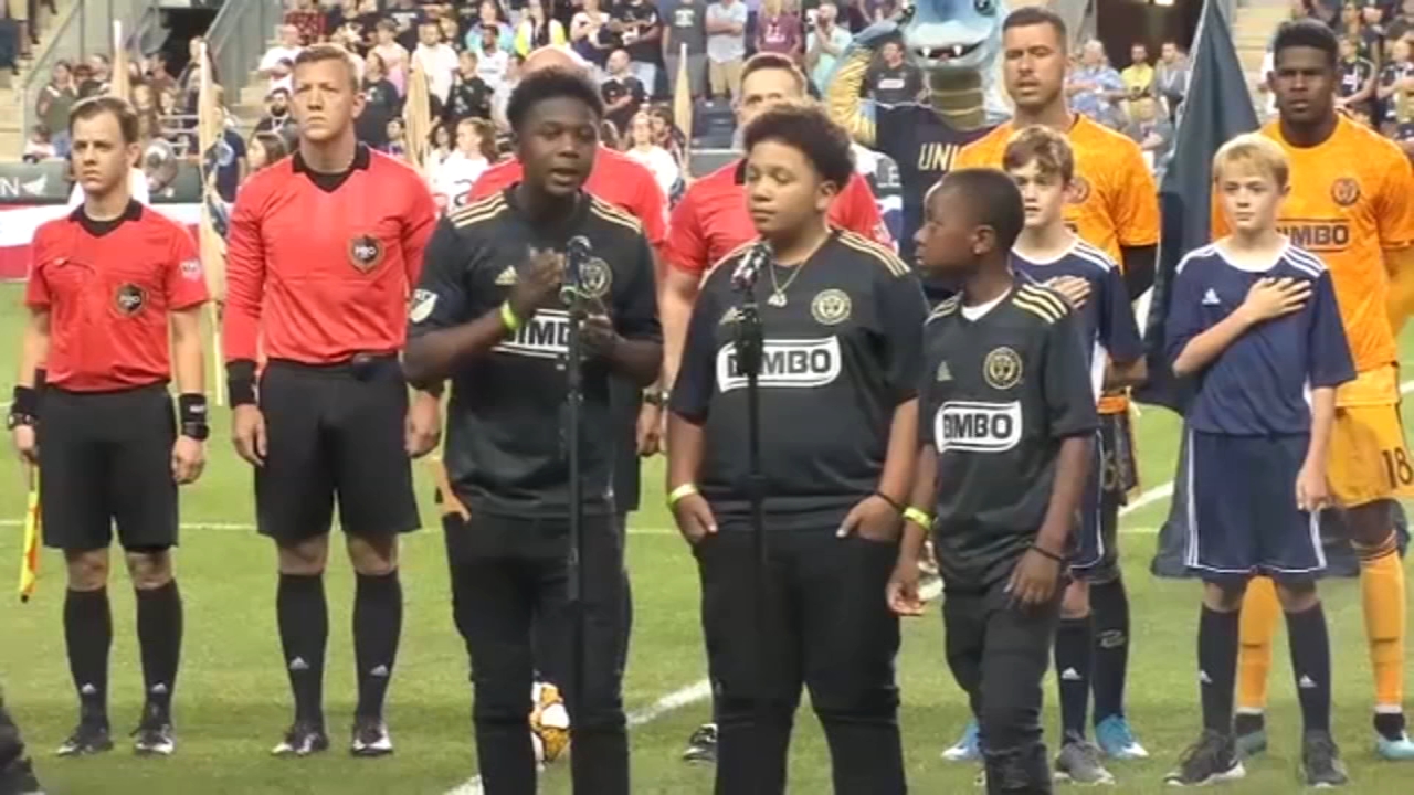 'Chester Trio' spreads positive message, sings at Union game