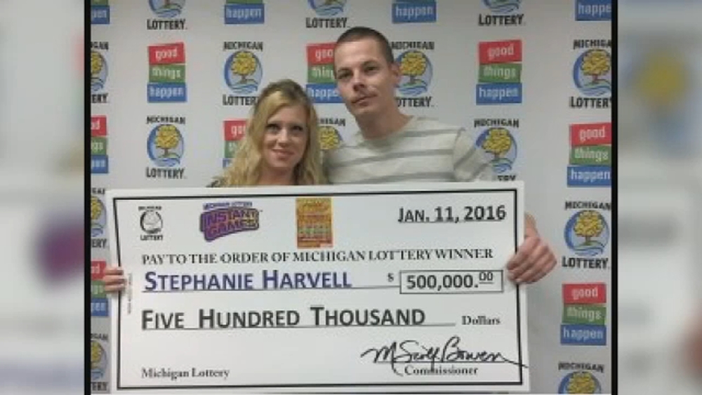 Lottery winners charged in burglaries