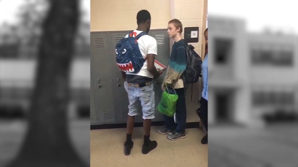 Classmates step in to help boy bullied over his clothes