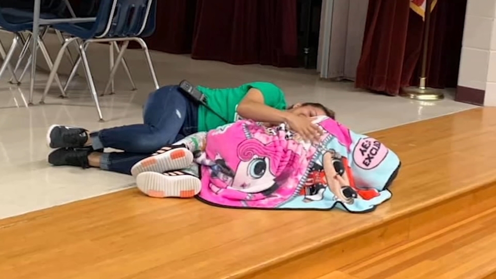 Custodian comforts girl with autism who had rough morning