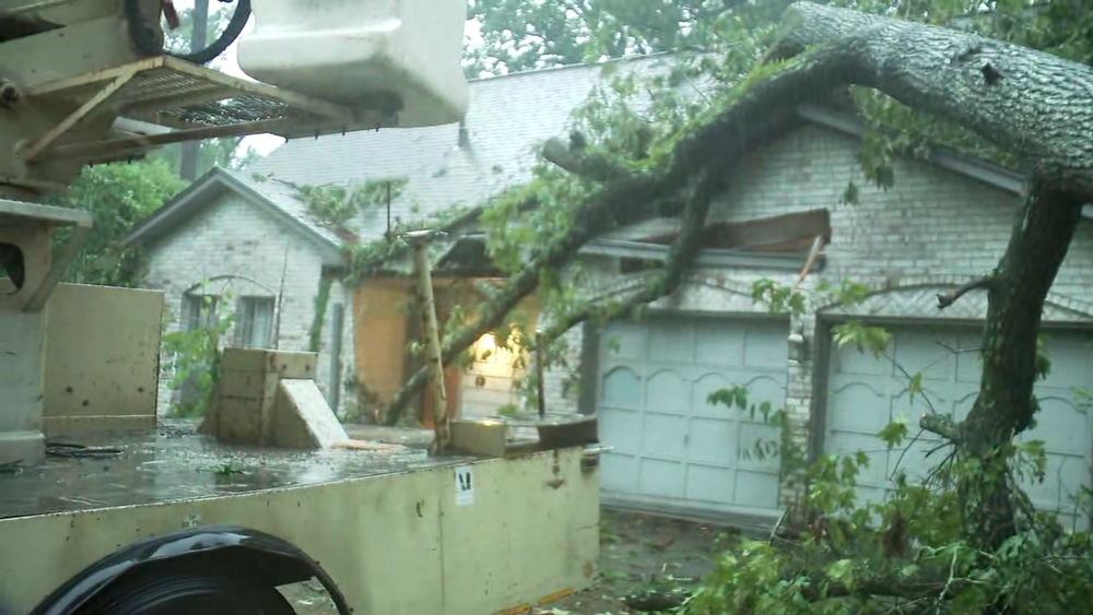 Tree topples over home in midst of severe weather in Kingwood