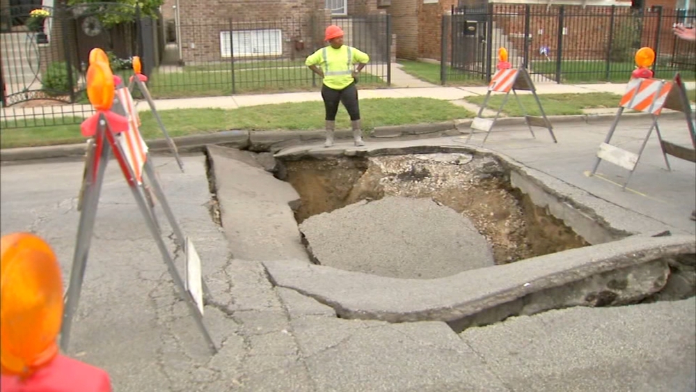 Sinkhole opens in street on Chicago's South Side