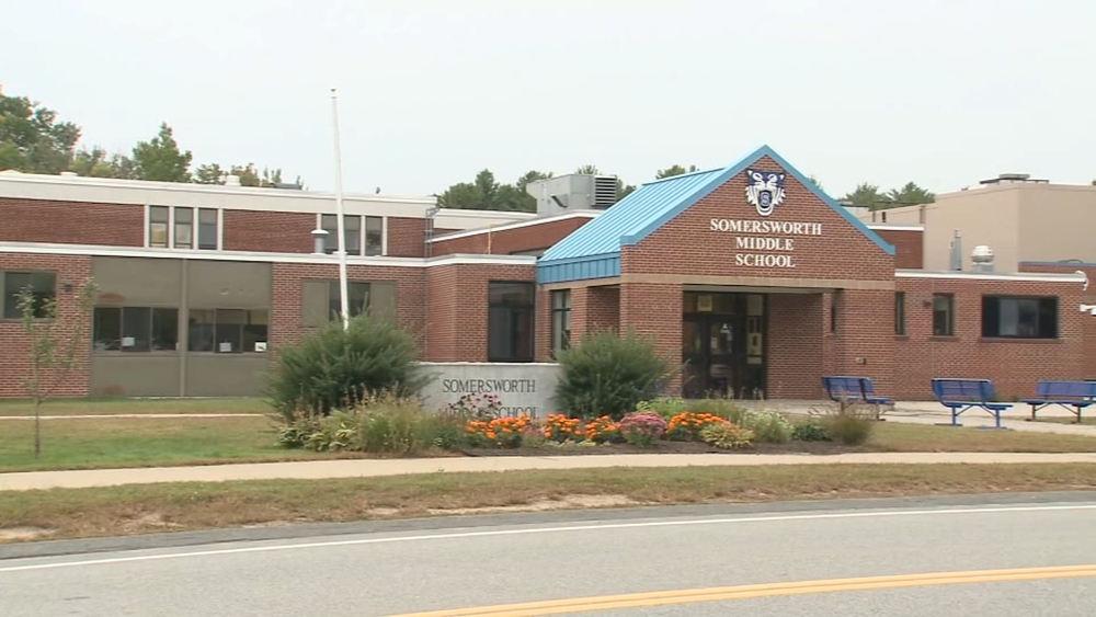 Teacher accused of cutting student's hair with scissors